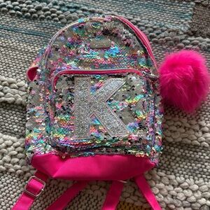 Justice Sequin Backpack in Silver and Hot Pink with Glitter 'K' and Pom Pom